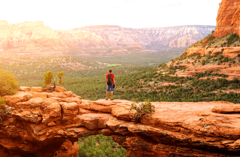 Man hiking in the red rocks of the Sedona Arizona