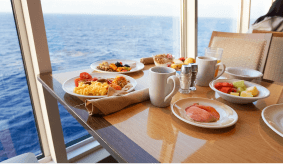 Food in table with the sea in the background