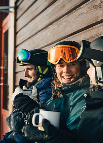 Two persons in ski outfit