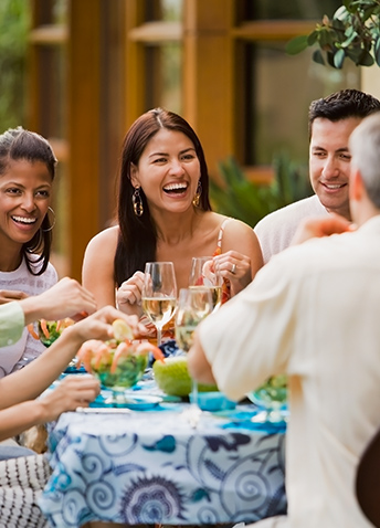 Smiling people sitting at a table